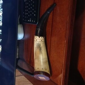 Old carved powder horn.